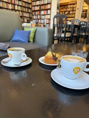 Coffee and cake in this beautiful bookstore!  at Librería Puro Verso in Montevideo