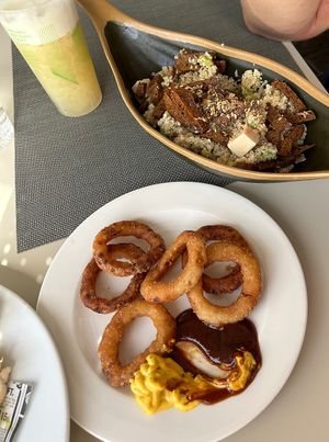 Poke bowl and onion rings  at H10 Costa Adeje Palace - Buffet Restaurant El Jable in Tenerife