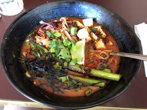 Laksa Ramen  at SOIL Vegan Café - East in Amsterdam