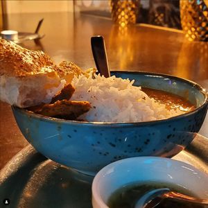 A must-have: Our Dal! It consists of red lentils of the highest quality, which r fair traded. We recommend a serving of rice with it, bread and green chili comes with it anyway. at tschüüüsch - plantpowered futurefood in Berlin