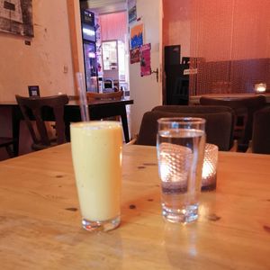 Mango Lassi at tschüüüsch - plantpowered futurefood in Berlin