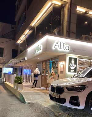 Storefront.   Took the pic before I knew that was Sarah going in!  at ALT.a - Dosan in Seoul