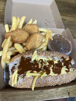 $19.99 snack box - Plant based maple macon dog with sauerkraut, vegan cheese and curry ketchup and plant based nuggets   at 5 Dogs in Fortitude Valley