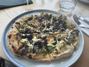 Mushroom Pizza with caramelised onion and vegan cheese - extremely tasty, haven’t had such a nice pizza in a while.   at The Beach House in Blackmans Bay