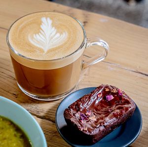 Dark Roast Oat Milk Latte and a Chocolate Cardamom Brownie! at Daily Bowl in Exeter