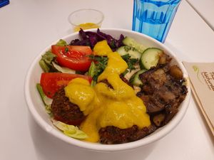 Falafel hummus bowl with mango kurkuma sauce at Csicseri Gozsdu in Budapest
