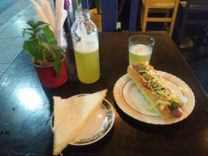 Um pancho caprichado e um sanduba vegano de jamon y queso.  at La Vegana in Buenos Aires