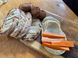 Vegan platter with felafel and hummus and not much else   at Waterfront Bar & Kitchen in Paraparaumu