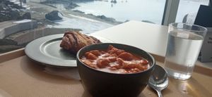 Soup (I put my bread in it as "crouton") and cinamon bun with a view at Kaffi Kvika in Myvatn