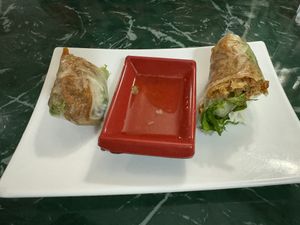 Fresh basil rolls (partially eaten)  at Lotus Vegan Restaurant in Pinellas Park