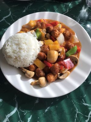 Orange protein dish  at Lotus Vegan Restaurant in Pinellas Park