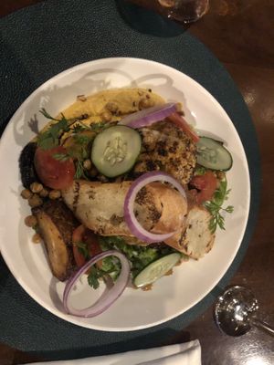 Charred cauliflower with paprika hummus and other delicious veggies!  at Poivre Noir in Kigali