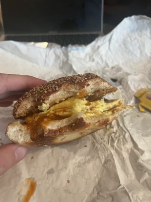 Fakin’ Bacon egg and cheese . Huge sandwich on a soft tasty everything bagel   at Her Daughters in Philadelphia