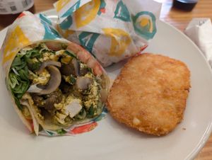 Breakfast burrito with tofu scramble, mushrooms, and hash brown at Vegan Grill - Upper East Side in New York City