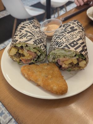 Breakfast burrito with just egg and sausage and chipotle mayo on the side +hash brown! at Vegan Grill - Upper East Side in New York City