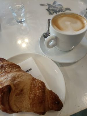 Vegan cappuccino and chocolate brioche at Martinik'a Caffè in Bologna