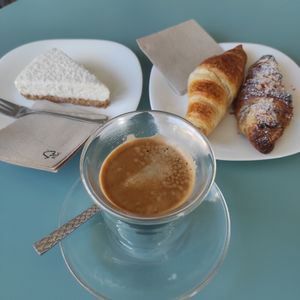 All Delicious!! Coconut cake, Croissants and coffee. at Fraise Café in Menton