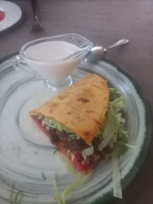 Half of the vegan pita (we ate the other half already!) Sauce is also vegan! at Cafe 1991 in Tashkent