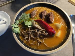 New item on the menu. Tofu falafel and soba soup.  at Cafe 1991 in Tashkent