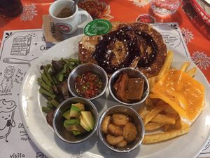 very hard rubbery tofu in the middle at La Desayunería  in Malaga