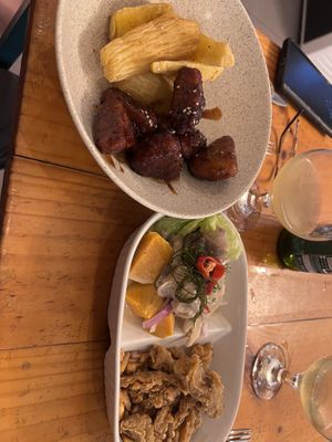 Vegan chicken styles chunks in teriyaki sauce and crispy cassava chips  at Asianica Street Food - temporarily closed in Lima