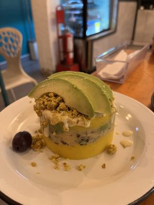 Pressed potato with olive, avocado, scrambled tofu, creole  at Asianica Street Food - temporarily closed in Lima