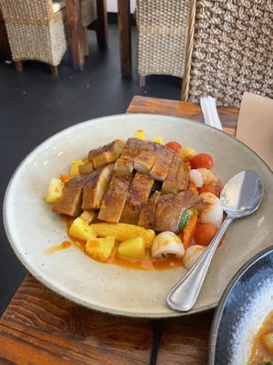Panang curry with duck  at Oops Modern Thai Restaurant in Sydney