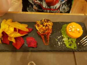 Vegetable chips, filled tomato and carrot and cheese patty. at il Giardino - Palatini Terme in Salzano