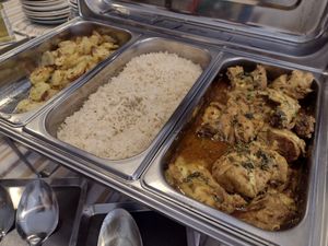 Tasty potatoes and rice, plus meat and fish dish (part of €11.45 buffet, which includes drink and coffee) at Cinco Cozinha Portuguesa e Vegetariana in Lisbon