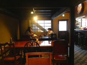 View from my table of the entrance area and the bar counter & kitchen to my right.  at Matsuontoko Cafe in Kyoto