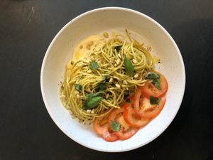 Broccoli pesto pasta with whipped lemon tofu, and a tomato and basil salad  at Dill's Cafe & Store in Falmouth