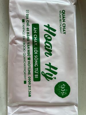 Wet wipe with restaurant details  at Hoan Hỉ Vegan in Qui Nhon