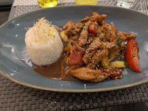 Lomo saltado at Los Andenes Vegan - Puerta de Toledo in Madrid