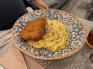 Huancaina milanesa y tallarines at Los Andenes Vegan - Puerta de Toledo in Madrid