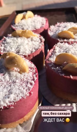 VEGAN RAW coconut dessert made on white chocolate, cashew nuts and cherry.  at Unex Coffee in Alanya