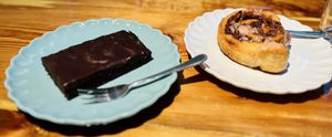 Brownie (left) and plum-walnut roll  at Das Jaartn in Berlin