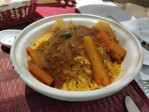 Vegetable tajine. Lots of couscous! at Les Arcades in Tozeur