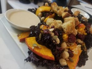 kale salad (no cheese) - roasted squash, local kale, dried cranberries, focaccia croutons, pumpkin & sunflower seeds, maple tahini dressing at Noble Rind Cheese Company in Viroqua