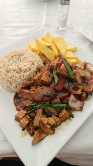 Second dish on the menu with seitan, tofu and mushrooms at Sazon Del Muya in Trujillo