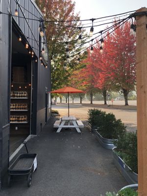 Outdoor seating in front and back  at Miss Hannah's Gourmet Popcorn in Newberg