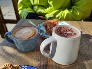 Two vegan cakes, an oat flat white and oat hot chocolate at Stanley & Ramona in York