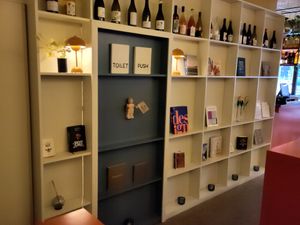 The toilet is behind these shelves at Beyla in Copenhagen