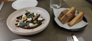 Cornbread, beetroot, pear, hazelnut and ricotta. at Beyla in Copenhagen