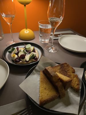 Beetroot. Smoked Ricotta. Pear. Hazelnut Pralina

Toasted Confit Garlic Corn Bread  at Beyla in Copenhagen