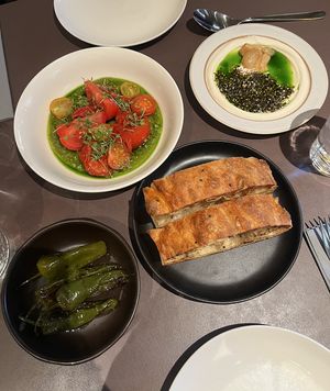 First course: Danish tomatoes, labneh, focaccia, peppers   at Beyla in Copenhagen