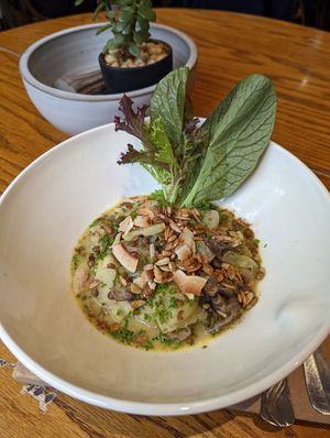 Curry with seasonal vegetables, shitake and crunchy seeds on top at Le Sain Bol in Montreal