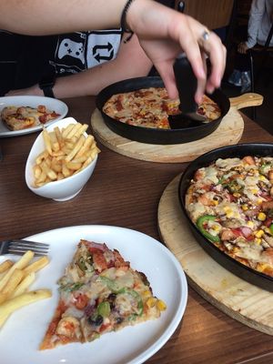 Top Pizza - Vegan meatfeast medium pizza (vegetarian option meat swapped out for sweetcorn). 
Bottom Pizza - Vegan veggie sausage medium pizza.
Both with vegan cheese and ordered with small portion of fries. at Mr Singh's in Birmingham