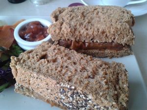 Vegan sausage sandwich at Flying Goose Cafe in Nottingham