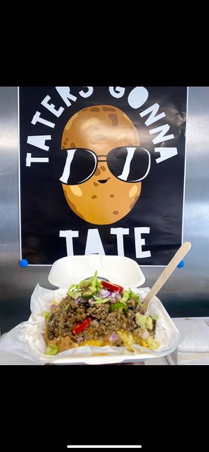 Baked potato + vegan cheese + haggis ( vegan ) at Spud & Shakes in Glasgow