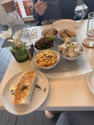 Burito met scrambled tofu (heerlijk) en tof salades to share   at Culture - Cafe & Deli in Inverness